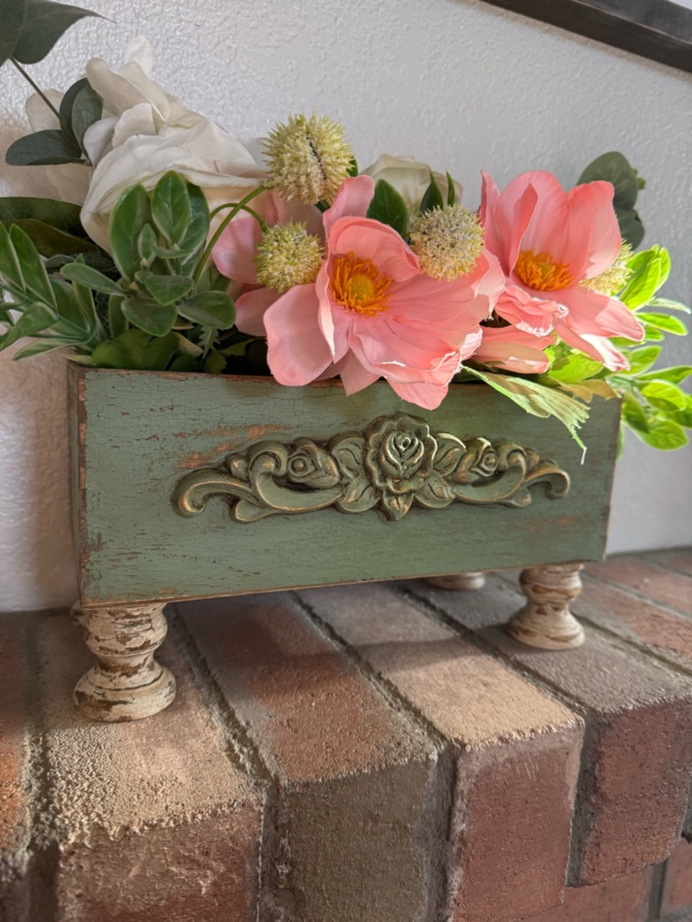 Vintage-Style Green Wooden Planter Box with Pink Floral Accent